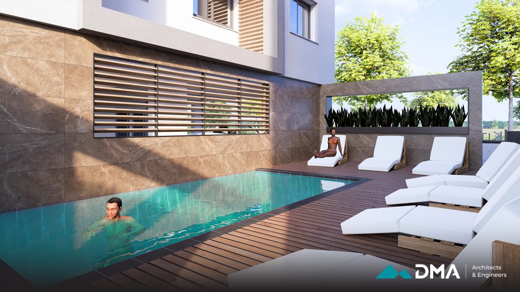 בריכה פרטית עם מיטות שיזוף בפרויקט Kiti Magic Residences בקפריסין – עיצוב מודרני באווירה יוקרתית
